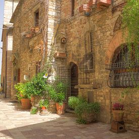 A picturesque street scene in Assisi by Berthold Werner