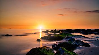Rotsen uitwatering zonsondergang Katwijk aan Zee