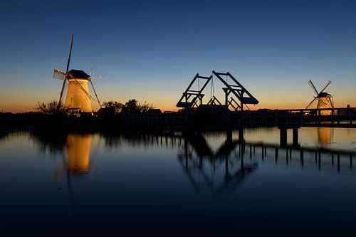 Windmills At Sunset von Robert van Brug
