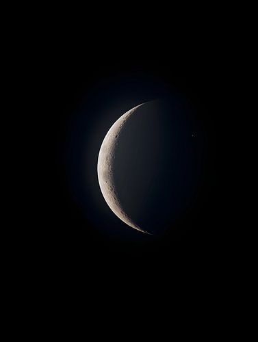 Crescent moon by night