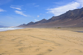 Cofete Beach on the island of Fuerteventura, overlooking the Atlantic Ocean by Tomherkules