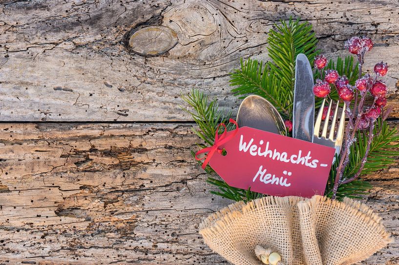 Christmas place setting with cutlery and tag by Alex Winter
