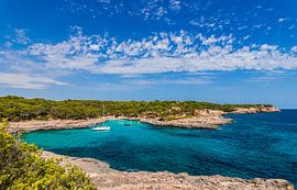 Idyllic view of beach bay with boats at Mallorca coast, Cala Mondrago by Alex Winter