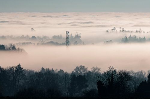 French winter landscape in the mist