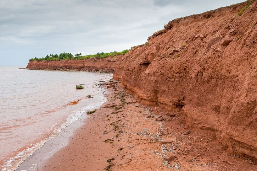 Red stone cliff in Nova Scotia/Canada by Hans-Heinrich Runge