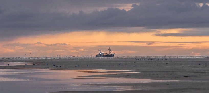 Fishing boat at sunrise by René van Leeuwen