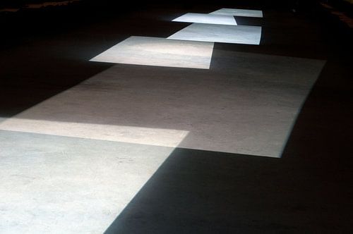 abstract: lightplay on the floor of a theater