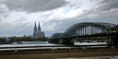 Cologne Drama – Cathedral and Bridge under Stormy Skies