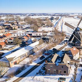 Mill in winter atmosphere by Ton Valk