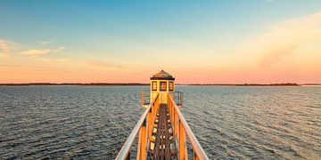 Le Lauwersmeer entre la Frise et Groningue au coucher du soleil sur Martin Bergsma