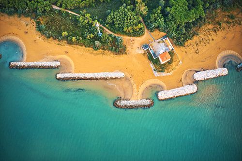 Bibione lighthouse in Italy on turquoise sea of the Adriatic Sea