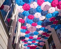 Beautiful light on umbrella's over street in Bordaux