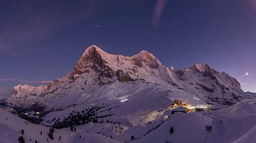 Panorama of the Eiger Mönch and Jungfrau and Wetterhorn at dusk in winter