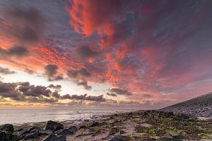 Genießen Sie einen spektakulären Sonnenuntergang über dem Wattenmeer