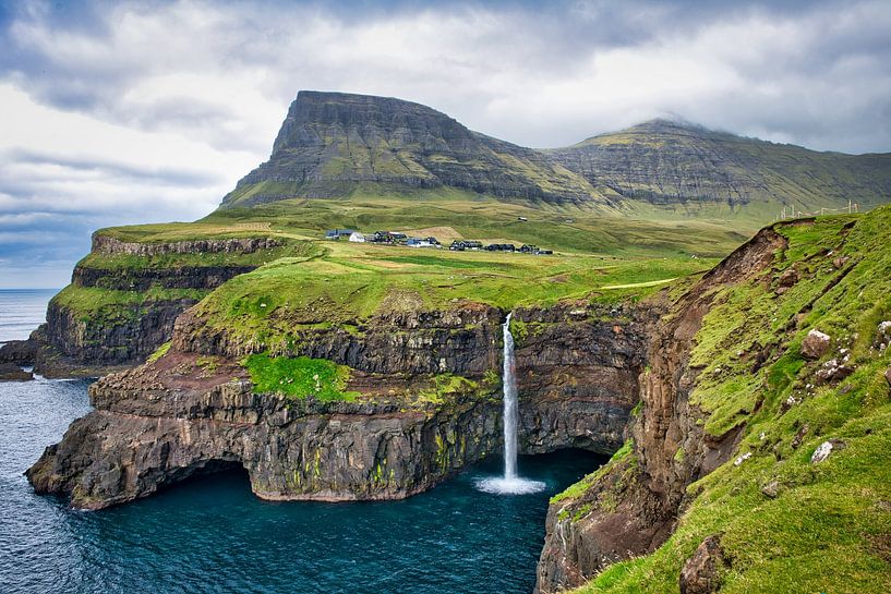 Múlafossur waterfall in the Faroe Islands. by Anita Loos