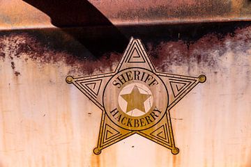 Sheriff star on door police car classic car in Hackberry Arizona Route 66 USA by Dieter Walther