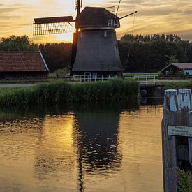 Holländische Mühle im Sonnenuntergang von Paul Franke