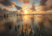 Zonsondergang aan het wad bij Koehool