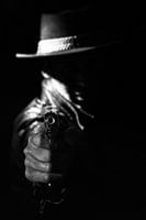 At gun point