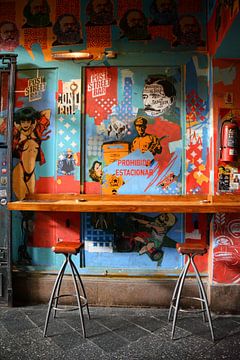 Colorful bar with bar stools and art Buenos Aires Argentina by My Footprints