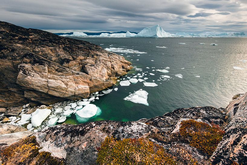 Rocky coast in bay in the Ilulissat icefjord in Greenland by Martijn Smeets