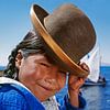 Aymara Indian girl with bowler hat at Titicaca lake, Bolivia by Frans Lemmens