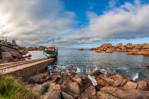 Lifeboat President Toutain sails out at Ploumanach in Brittany, France.