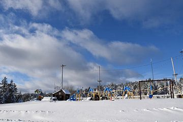 The playground in winter by Claude Laprise