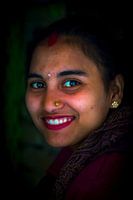Smiling Nepali saleswoman
