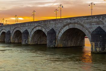 Beautifully coloured sunrise at the Sint Servaas bridge in Maastricht