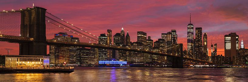Skyline of Manhattan and Brooklyn Bridge at sunset, New York, USA by Markus Lange