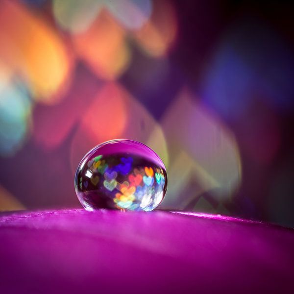 Macro of a drop with hearts by Bert Nijholt