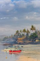 Traditional Indonesian fishing boats on the beach of Candidasa on Bali