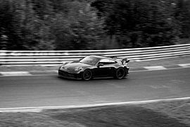 Porche 911 zwart wit van Jim Plaum