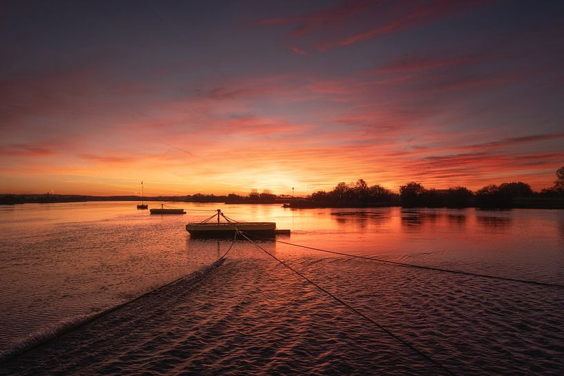 Fiery sunrise at slurry sponge spring Eck and Wiel by Moetwil en van Dijk - Fotografie