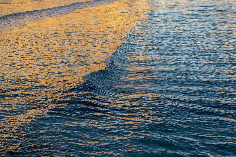 Golden sea waves at sunrise by Adriana Mueller