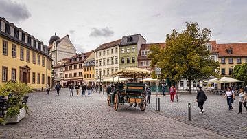 Square with horse-drawn carriage in the city of Weimar by Rob Boon
