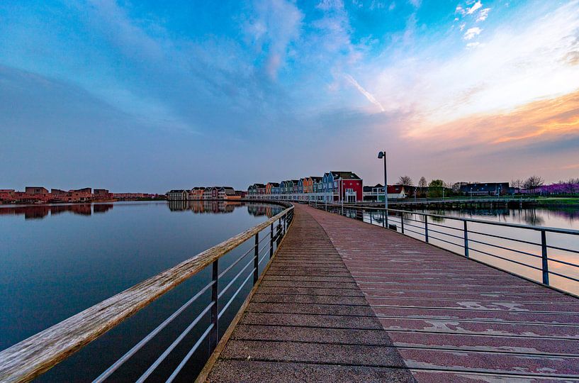 Bridge over calm water by Rene Siebring