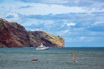 Rock and ship on the island of Madeira, Portugal by Rico Ködder