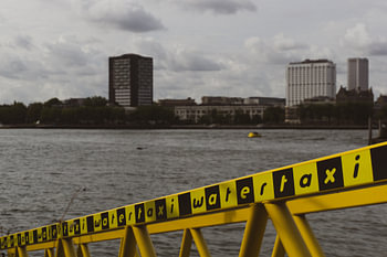 Water taxi and the Maas.