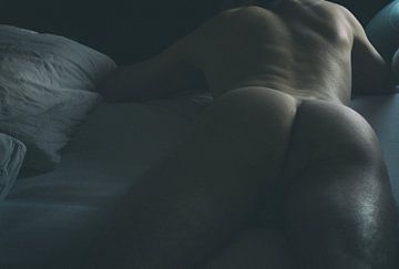 virile nude in bed by Frank Hertoch