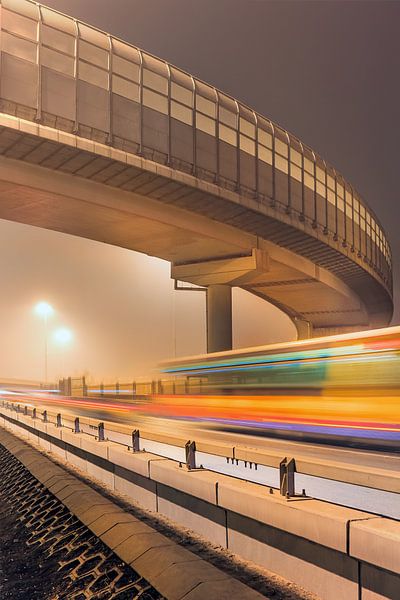 Elevated highway at night with motion blur by Tony Vingerhoets