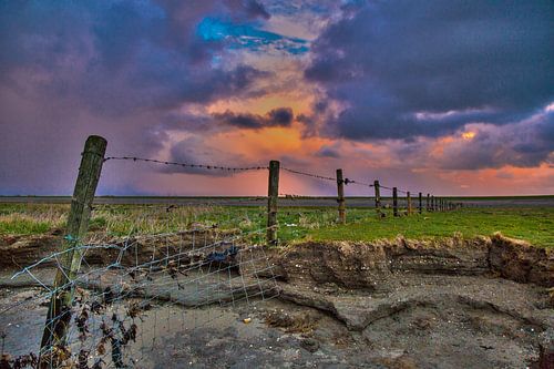 zonsondergang met hek