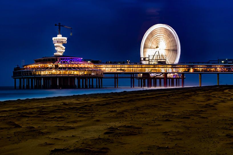 Scheveningen The Hague the famous pier in the evening by Fotos by Jan  Wehnert on canvas, poster, wallpaper and more