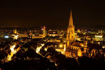 Germany, Lights of Freiburg im Breisgau in the night by adventure-photos