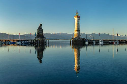 Lighthouse and Bavarian Lion in the harbour of Lindau at Lake Constance