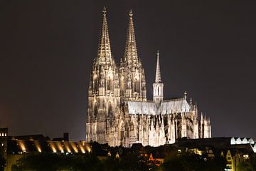 Illuminated Cologne Cathedral at night by Tom Voelz