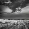 Storm op het strand van Hans Kwaspen