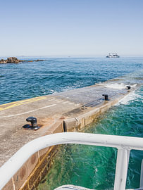 arrival at the quay by Michael Schulz-Dostal
