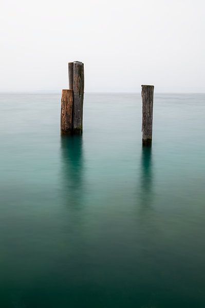 Piles in Lake Garda by Mark Bolijn
